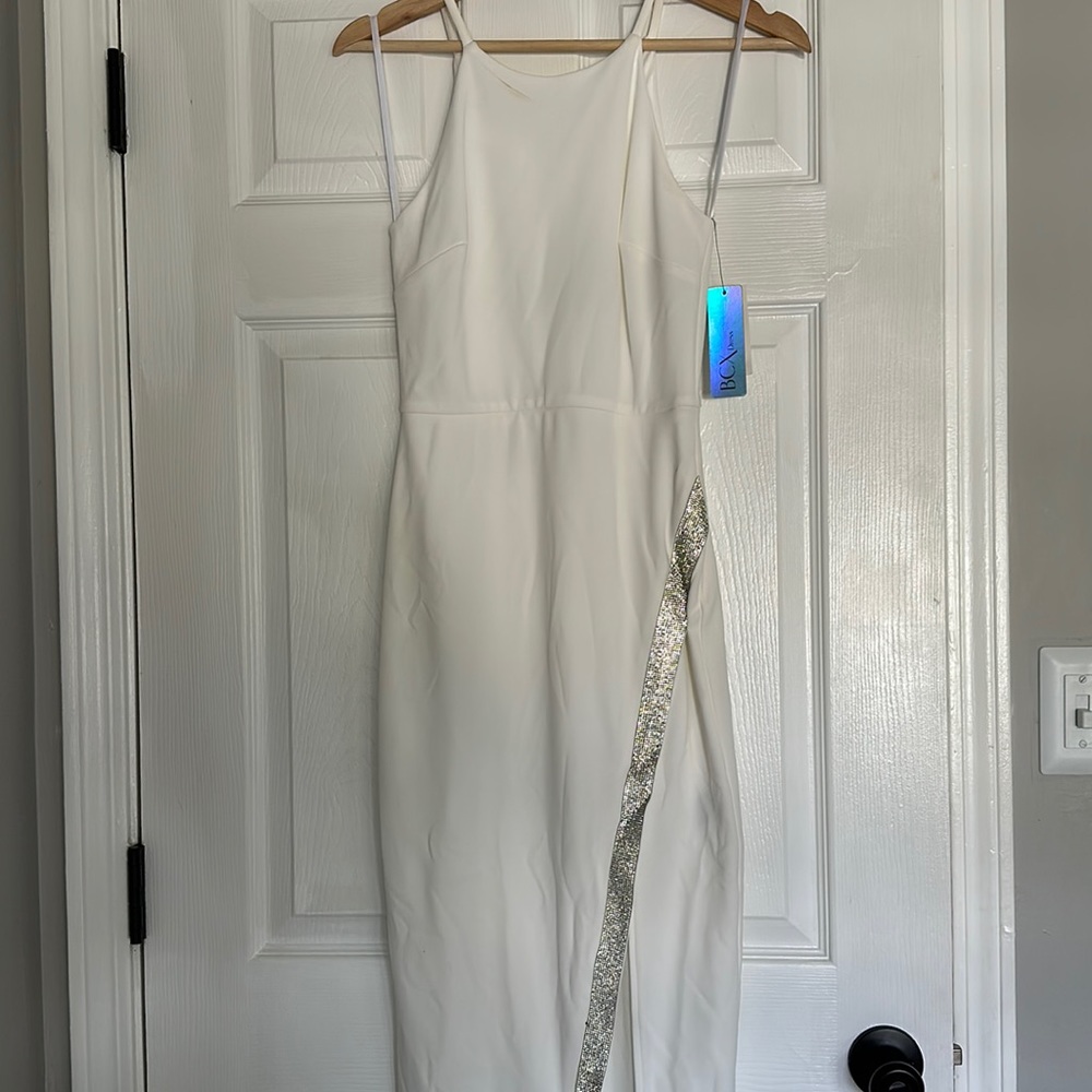 Women’s dress a small makeup stain on top front part of dress.